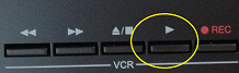 an image of the 'play' button on the VCR