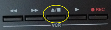 an image of the stop/eject button on the VCR